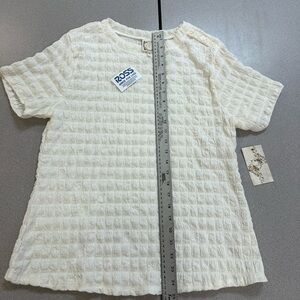 Elegant Women's Cream Textured Long Sleeve Top